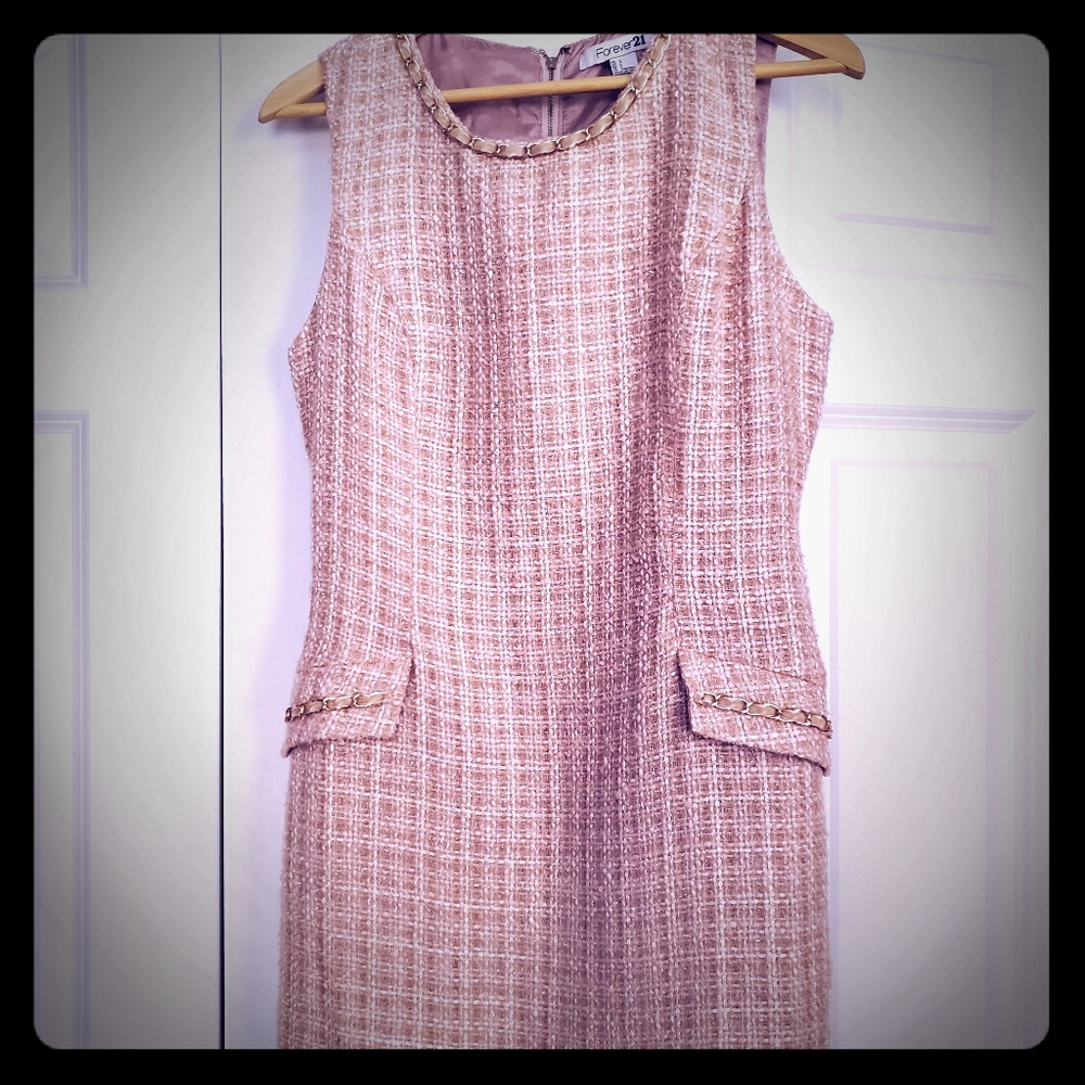 Pink wool dress with metal design